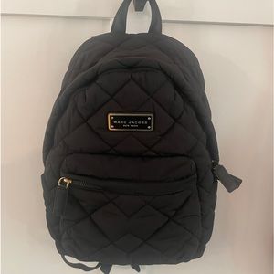 Marc Jacobs quilted bookbag.